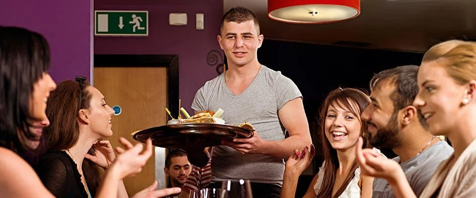 Food Service Suppliers interacting with staff and customers in a professional setting