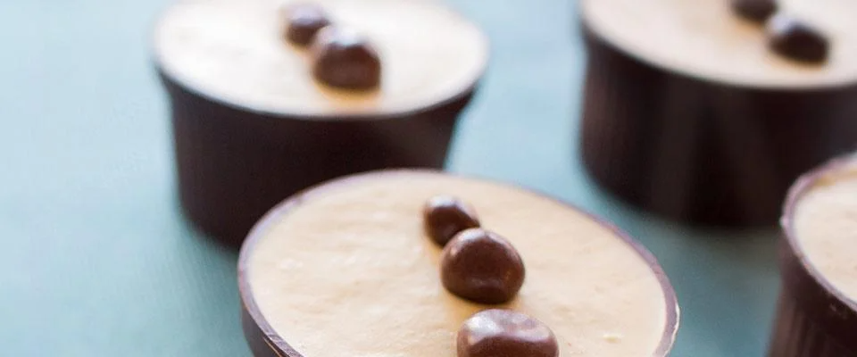 Chocolate-covered desserts with a creamy filling, highlighting the sweet spot of indulgence.