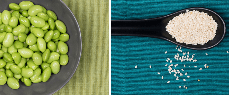 A bowl of soybeans and a spoon of sesame seeds, highlighting food allergies risks.