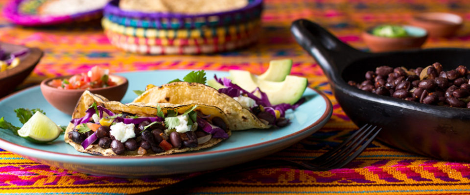 Complementary proteins across cultures,black bean tacos with avocado and salsa.