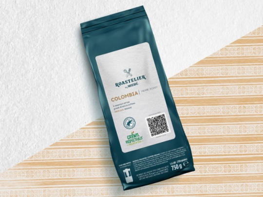 A coffee bag placed on a clean white background, highlighting its design and branding.