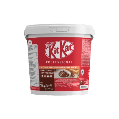 A bucket with KitKat chocolate pudding, highlighting its tempting chocolatey goodness.