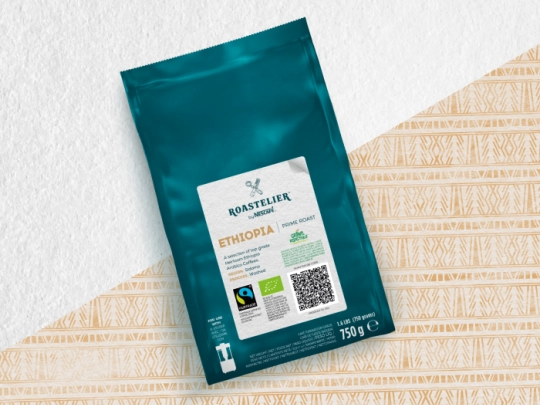 A paper coffee packaging showcasing an eco-friendly design, emphasizing sustainability and quality.