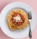 Delicious spaghetti served with a hearty tomato sauce and ground meat, ready to enjoy.