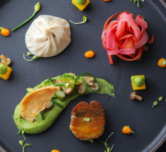 A plate filled with colorful food items, showcasing a variety of textures and flavors.