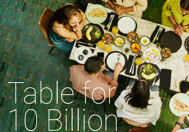 An enormous table designed for ten billion guests, filled with lavish dishes and decorations.