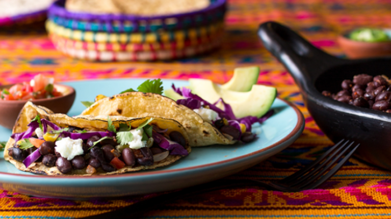 Complementary proteins across cultures,black bean tacos with avocado and salsa.