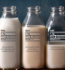 Different types of milk bottles, featuring whole, skim, and plant-based milk options.