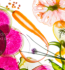 A vibrant display of assorted vegetables and flowers arranged together in a colorful composition.