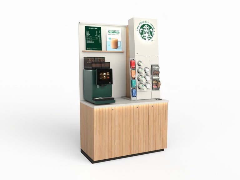 A coffee machine stands against a white background, showcasing its sleek design and features.